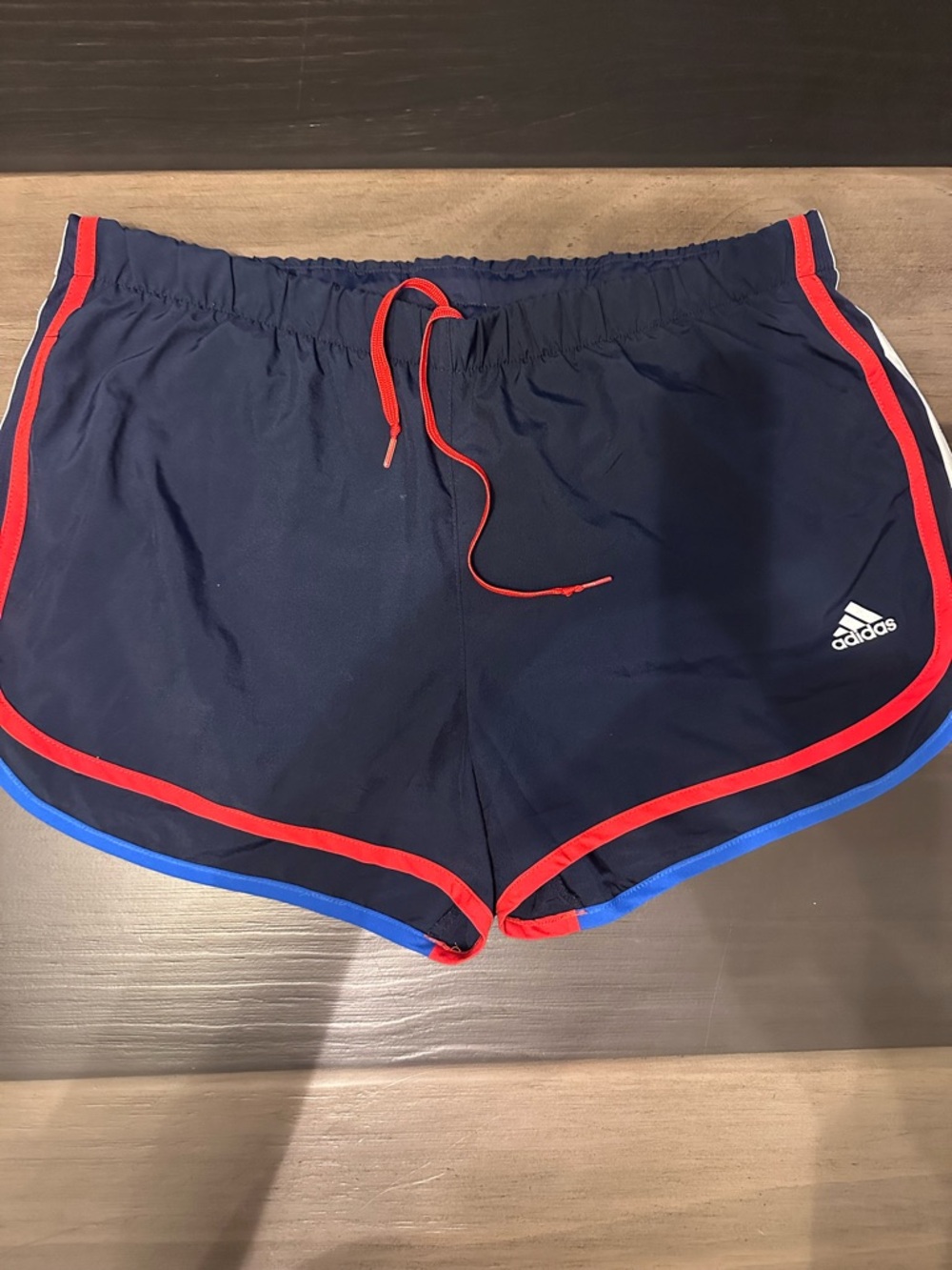Adidas Navy Athletic Shorts with Red Trim and Blue Edge